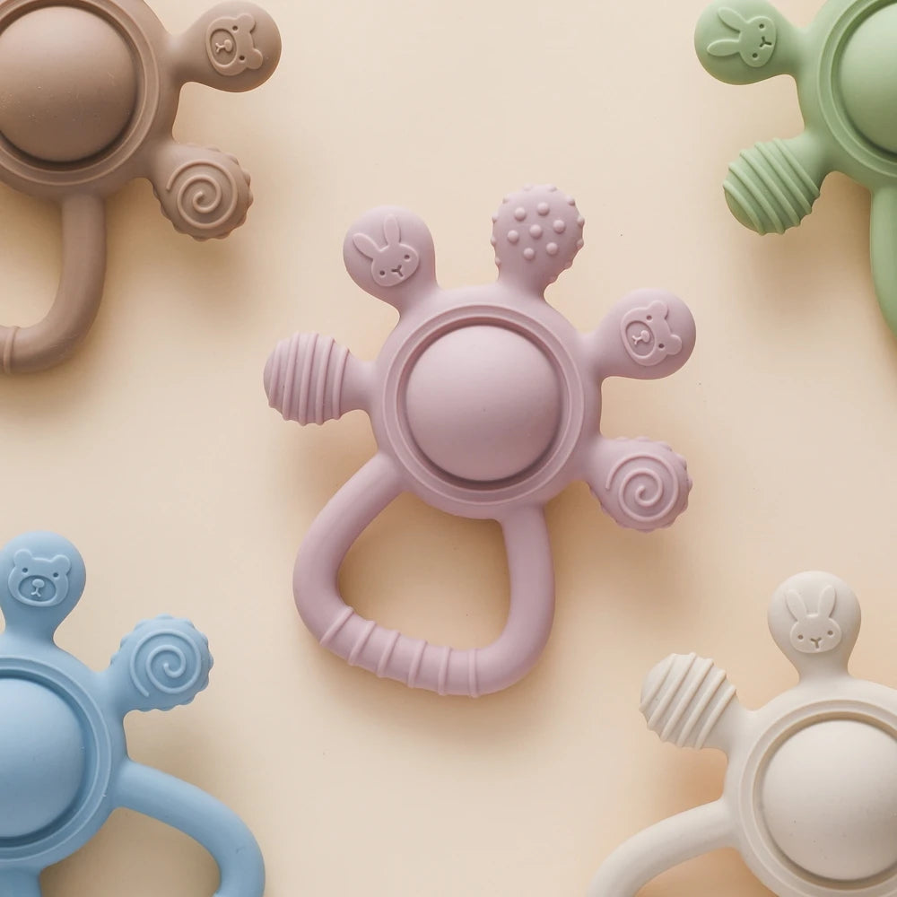 Silicone Teether,Food Grade Baby 0-12 Toys,Teething Rattle Sensory Toys for Toddlers,Silicone Hand Bell,Silicone Soothing Toys